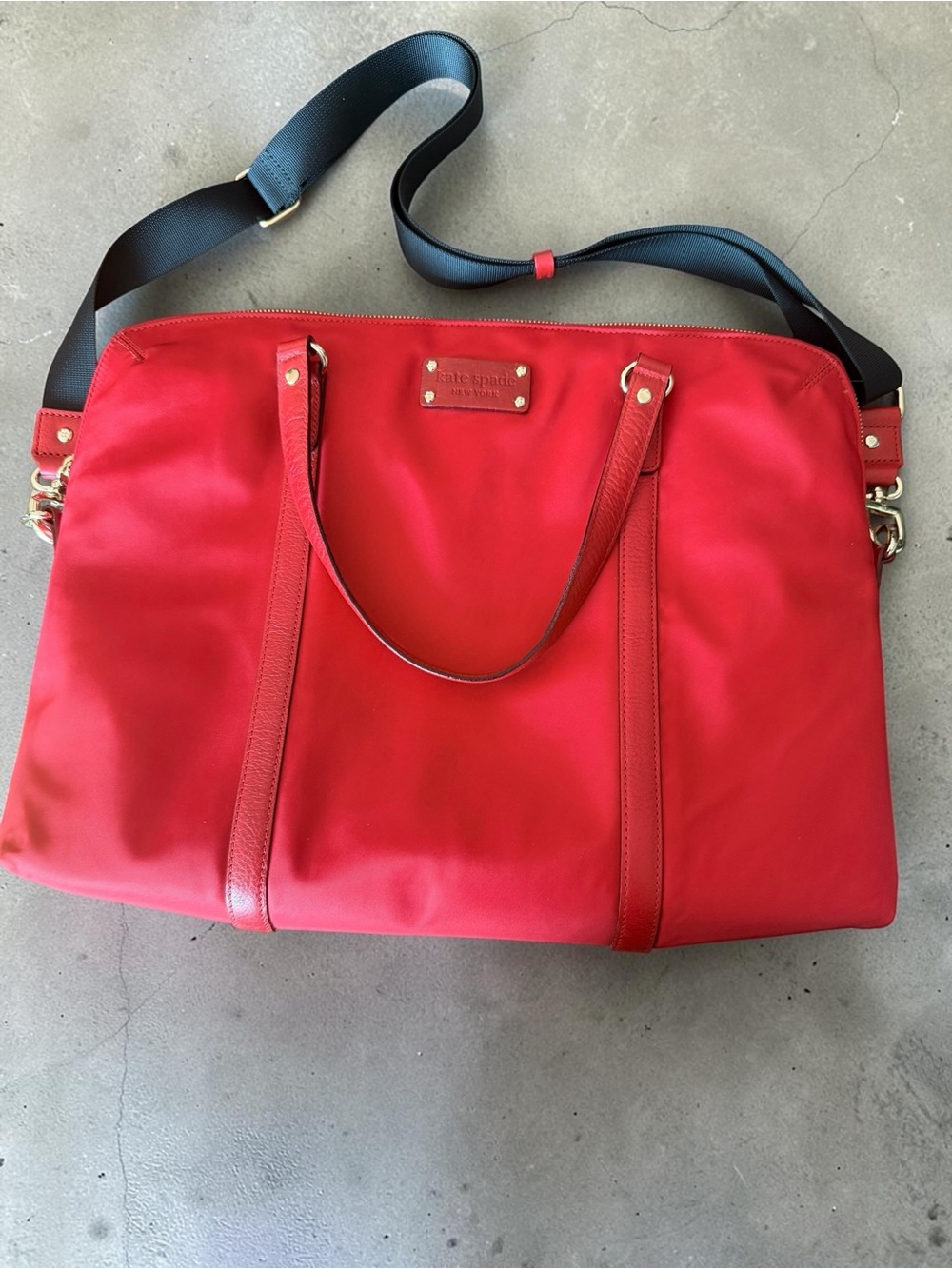 Vibrant red Kate spade laptop tote bag